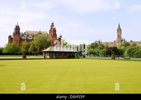 Newly laid bowling greens with the Glasgow Art Gallery and University Stock Photo