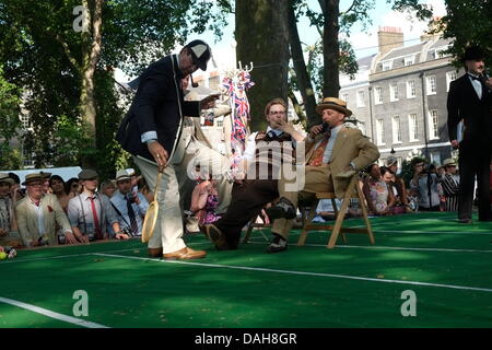 London, UK. 13th July, 2013. The Chap Olympiad 2013, in Bloomsbury London. Sporting events include Breadbasket Ball, Bounder Hunt and  Briefcase Phalanx Credit:  Rachel Megawhat/Alamy Live News Stock Photo