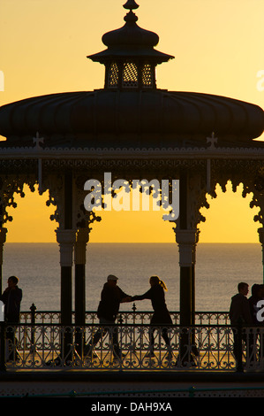 Dancing salsa on the Victorian bandstand, Brighton, Engand Stock Photo