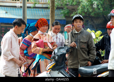 Group of Flower Hmong men and women in Bac Ha, Vietnam Stock Photo