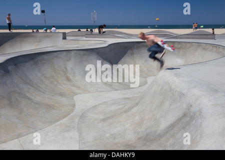 Skateboarder at landmark skate park at Venice Beach, CA seen on Aug. 14, 2012. Stock Photo