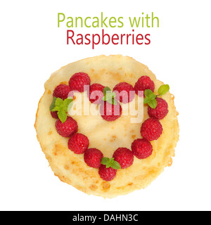 Stack of pancakes with fruit isolated on white Stock Photo