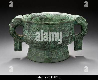A ritual grain server, or Gui, featuring dragon-shaped handles. This ...