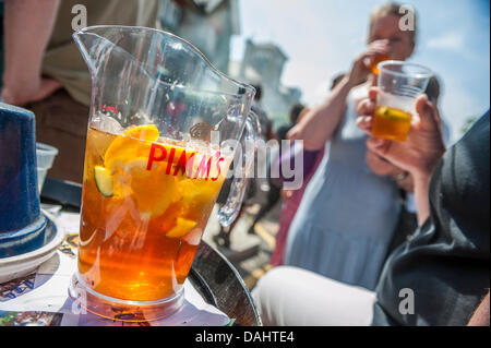 London, UK. 14th July, 2013. Sunshine, Pimms, face painting and sumo - all part of a modern British Summer Fair.  Nightingale Lane, London UK. Credit:  Guy Bell/Alamy Live News Stock Photo