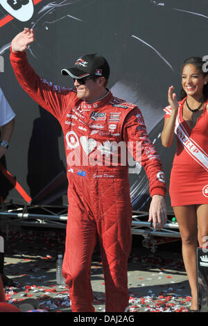 Toronto, Ontario, Canada. 14th July, 2013. Toronto, Ontario, Canada, July 14, 2013. IZOD Indy driver Scott Dixon celebrates his victory in race 2 at the Honda Indy Toronto at Exhibition Place, Toronto July 14th.Gerry Angus/CSM/Alamy Live News Stock Photo