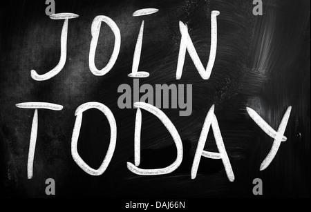 Join today handwritten with white chalk on a blackboard Stock Photo