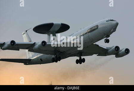 (dpa File) A file picture, dated 1 August 2008, shows a NATO Awacs reconnaissance aircraft during take off at the NATO airbase in Geilenkirchen, Germany, 01 August 2008. The German government wants to deploy 300 more troops for reconnaissance flights over Afghanistan, the German news agency dpa was told by government sources on 22 March 2011. The move comes in an effort to relieve  Stock Photo