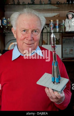 Cosmonaut Sigmund Jaehn is pictured with a model of the Soyuz rocket in Strausberg, Germany, 08 March 2011. Jaehn was the first German person to fly to space with the Soyuz 31 space flight in 1978. Photo: Robert Schlesinger Stock Photo