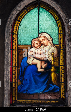 A stained glass window on a grave in Père Lachaise cemetery, Paris, France Stock Photo