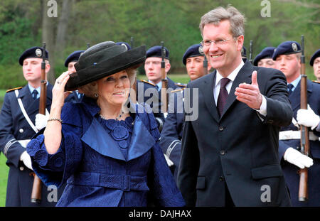 Queen Beatrix of The Netherlands is welcomed by German state president Christian Wulff in front of Bellevue Castle in Berlin, Germany, 12 April 2011. According to the motto 'The new Germany' the Royal Family started its state visit of Germany and will stay for four days. PHOTO: WOLFGANG KUMM Stock Photo