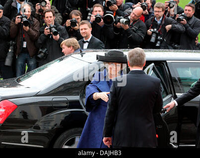 Queen Beatrix of The Netherlands is welcomed by German state president Christian Wulff in front of Bellevue Castle in Berlin, Germany, 12 April 2011. According to the motto 'The new Germany' the Royal Family started its state visit of Germany and will stay for four days. PHOTO: WOLFGANG KUMM Stock Photo