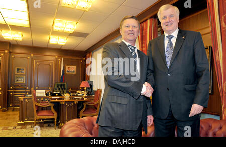 The Bavarian state premier Horst Seehofer (R) is welcomed by Deputy Prime Minister Sergej Iwanow for converation in Iwanow' study in Moscow, Russia, 12 April 2011. Seehofer stays in Moscow and Saint Petersburg together with a business and science delegation until 14 April 2011. PHOTO: PETER KNEFFEL Stock Photo