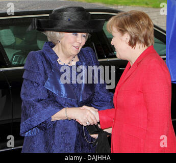 Queen Beatrix of The Netherlands (L) is welcomed by German Chancellor Angela Merkel at the Chancellery in Berlin, Germany, 12 April 2011. The royal family is on a four-day-visit to Germany. Photo: Patrick van Katwijk Stock Photo
