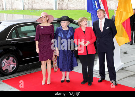 Princess Maxima of The Netherlands (L-R), Queen Beatrix and Crown Prince Willem-Alexander are welcomed by German Chancellor Angela Merkel (2ndR) at the Chancellery in Berlin, Germany, 12 April 2011. The royal family is on a four-day-visit to Germany. Photo: Patrick van Katwijk Stock Photo