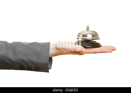 Hand holding hotel bell on the palm Stock Photo