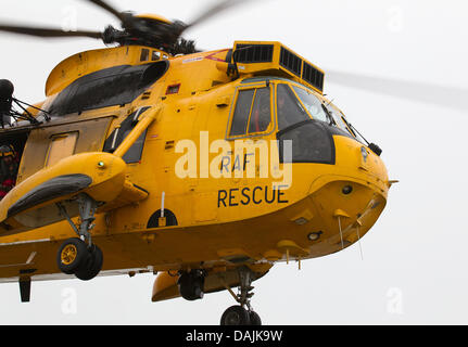 (HANDOUT) A handout dated 16 April 2011 shows Flight Lieutnant William Wales, Prince William (in cockpit L) as co-pilot of a rescue helicopter during an MIRG exercise (Marratime incident response group) at the air force base RAF Valley on Angelsey Island, Great Britain. Since completely his training as a helicopter pilot on the island in Northwest Wales, Prince William doesn't want Stock Photo