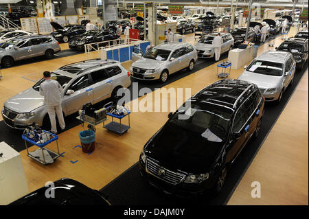 A file picture dated 28 January 2009 shows the production of the VW Passat model in the Volkswagen factory in Emden, Germany. The biggest European car manufacturer VW have not sold as many cars in the first three months of a year as in 2011. With about two million distributions Volkswagen reached a new record, as the company reported. Compared to the first quarter of 2010 VW sold 1