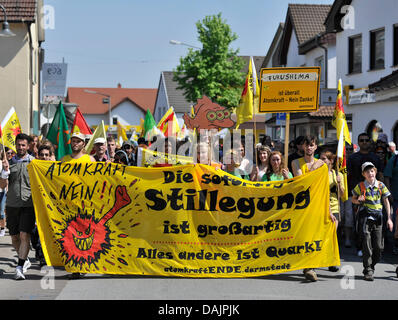 Anti-nuclear activists stage a protest in the city of Biblis, Germany, 25 April 2011. 26 April 2011 marks the 25th anniversary of the Chernobyl nuclear disaster - a date that sparks anti-nuclear protests all over Germany. Photo: Marius Becker Stock Photo