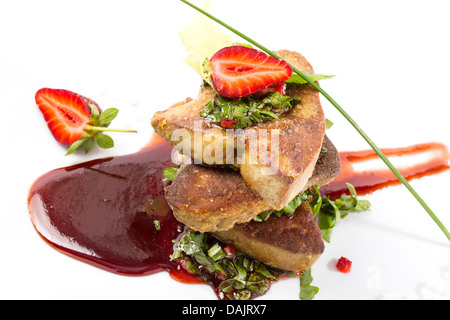 foie gras garnished with strawberries Stock Photo