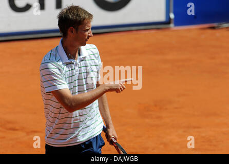 The German tennis pro Florian Mayer gestures during his quarterfinal match with compatriot Philip Petzschner at the ATP Tennis Tournament in Munich, Germany, 30 April 2011. Mayer won 6:3, 6:4. Photo: Andreas Gebert Stock Photo