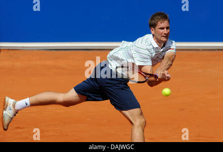 The German tennis pro Florian Mayer hits a backhand during his quarterfinal match with compatriot Philip Petzschner at the ATP Tennis Tournament in Munich, Germany, 30 April 2011. Mayer won 6:3, 6:4. Photo: Andreas Gebert Stock Photo