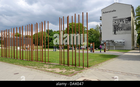 Marking of the path of the Wall through steel beams, photo showing the construction of the wall on a building on Ackerstrasse Stock Photo