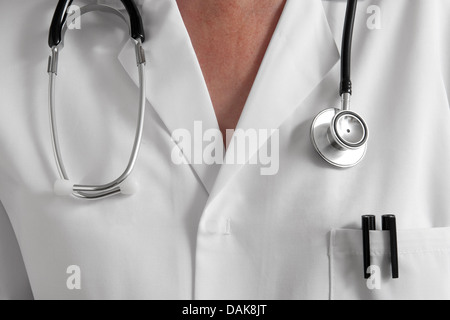 woman doctor in white coat with stethoscope around neck Stock Photo