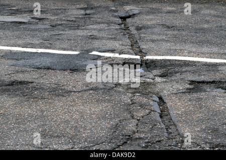 damage to the road surface by frost in winter, Germany Stock Photo