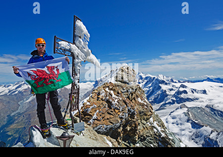 climber on the summit of the Matterhorn (4478m), Zermatt, Swiss Alps, Switzerland, Europe (MR) Stock Photo