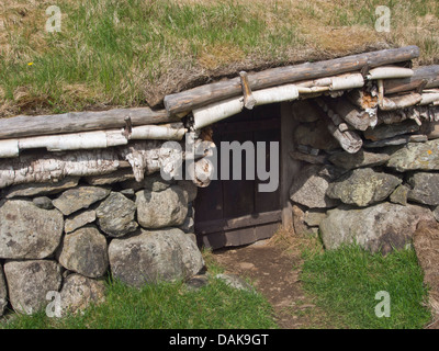 Reconstructed  ancient iron age longhouses on archaeological site in Ullandhaug Stavanger Norway, detail of door and roof Stock Photo