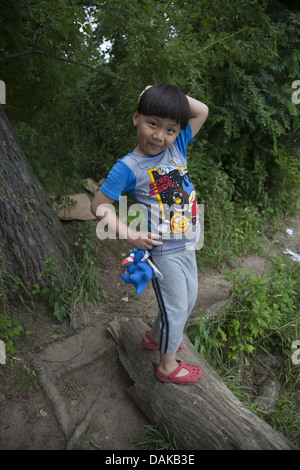 Happy Korean child in Prospect Park, Brooklyn, New York. Stock Photo