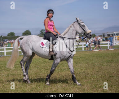 Stithians, UK. 15th July, 2013. Riders prepares her horse for the event at the Stithians show, Cornwall's biggest one day show. Credit:  Bob Sharples/Alamy Live News Stock Photo