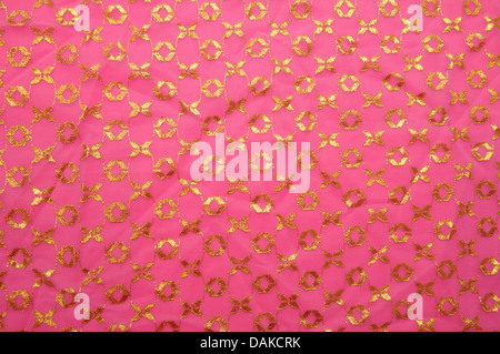 Pink vintage cloth with golden decoration Stock Photo