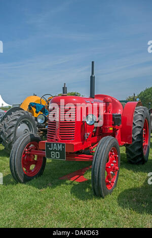 Stithians, UK. 15th July, 2013. Red  Antique Classic Tractor on Show at the Stithians show, Cornwall's biggest one day show. Credit:  Bob Sharples/Alamy Live News Stock Photo