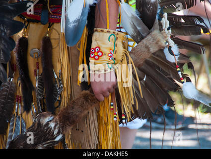 The proud Mohawk nation living in Kahnawake native community located on the south shore of the St Lawrence river in Quebec Canada celebrates it's annual Pow-Wow with traditional dances and drum music Stock Photo