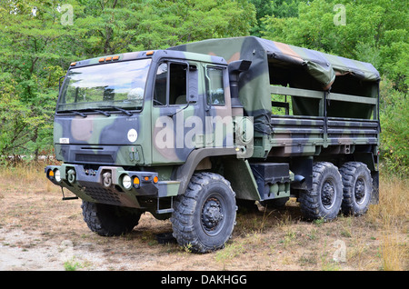 Military personnel carrier, 2 1/2 ton truck in camouflage. Stock Photo