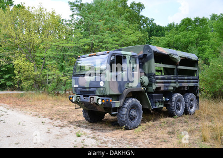 Military personnel carrier, 2 1/2 ton truck in camouflage. Stock Photo