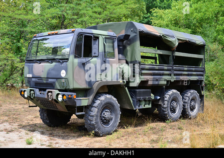 Military personnel carrier, 2 1/2 ton truck in camouflage. Stock Photo