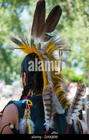 The proud Mohawk nation living in Kahnawake native community located on the south shore of the St Lawrence river in Quebec Canada celebrates it's annual Pow-Wow with traditional dances and drum music -July13-14 2013 Stock Photo