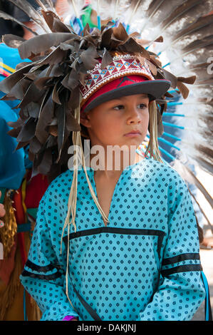 The proud Mohawk nation living in Kahnawake native community located on the south shore of the St Lawrence river in Quebec Canada celebrates it's annual Pow-Wow with traditional dances and drum music -July13-14 2013 Stock Photo