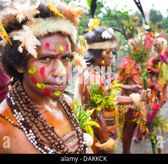 Women in the Selehoto Alunumuno tribe in traditional tribal dress and with their faces painted, highlands of Papua New Guinea Stock Photo