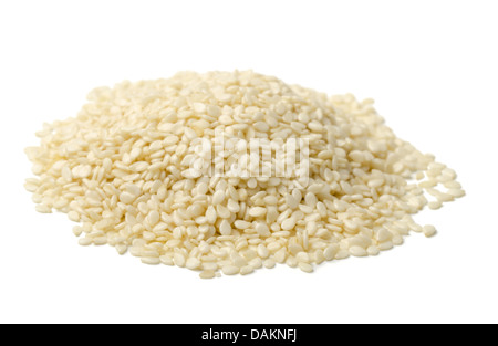 Pile of white sesame seeds isolated on white Stock Photo