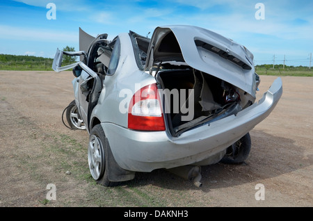 Broken Car after a Crash. Damaged Wing and Headlamp of a Car