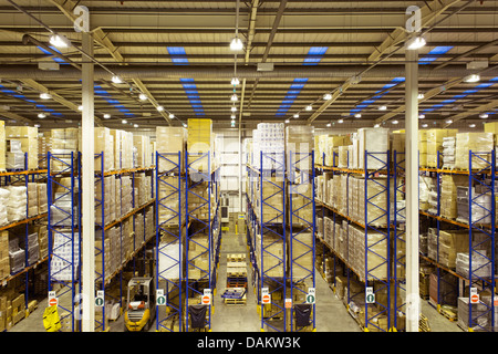 Stacks of boxes in warehouse Stock Photo
