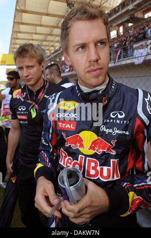 German Formula One driver Sebastian Vettel of Red Bull prepares for the start of the race at the Istanbul Park Circuit, outside Istanbul, Turkey, 08 May 2011. Photo: David Ebener dpa Stock Photo
