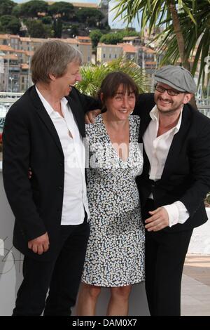 German director Andreas Dresen (l-r), actress Steffi Kuhnert and actor Milan Peschel pose at the photocall of 'Halt auf freier Strecke' at the 64th Cannes International Film Festival at Palais des Festivals in Cannes, France, on 15 May 2011. Photo: Hubert Boesl Stock Photo