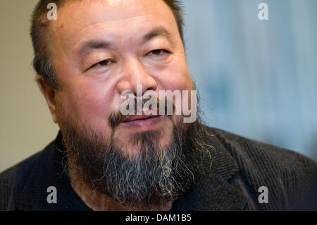 (file) - A dpa fiel picture dated 04 April 2009 shows Chinese artist Ai Weiwei at Theater am Goetheplatz during a visit to Bremen, Germany. After six weeks of imprisonment, Ai Weiwei's wife was allowed to visit him on 15 May 2011. Photo: Michael Bahlo Stock Photo