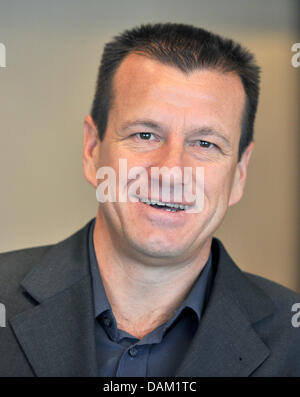 The former Brasilian national soccer player Carlos Dunga stands inside the foyer of the Hotel Steigenberger Frankfurter Hof in Frankfurt/Main, Germany, 16 May 2011. Sergio joined the press conference on the presentation of the 'Brazilmasters 94.02' Photo: Marc Tirl Stock Photo