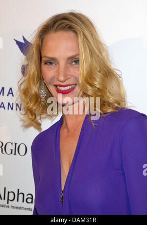 Munich, Germany. 23rd April, 2013. Patrick-Louis Vuitton (L-R), US actress  Uma Thurman and Benoit-Louis Vuitton pose at the opening of a new store of  the French fashion label Louis Vuitton in Munich