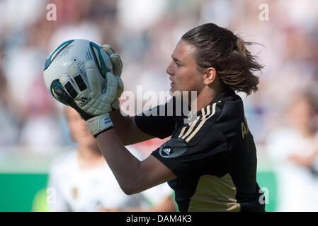 Germany's goalkeeper Nadine Angerer catches the ball during the soccer friendly match Germany vs. North Korea in Ingolstadt, Germany, 21 May 2011. Photo: Andreas Gebert Stock Photo